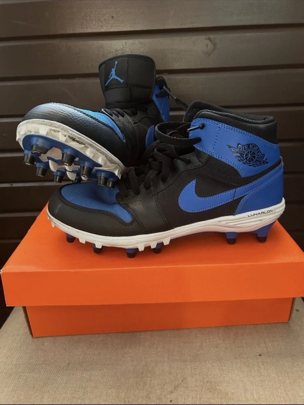 Jordan 1 Mid Black and Blue High-Top Cleats